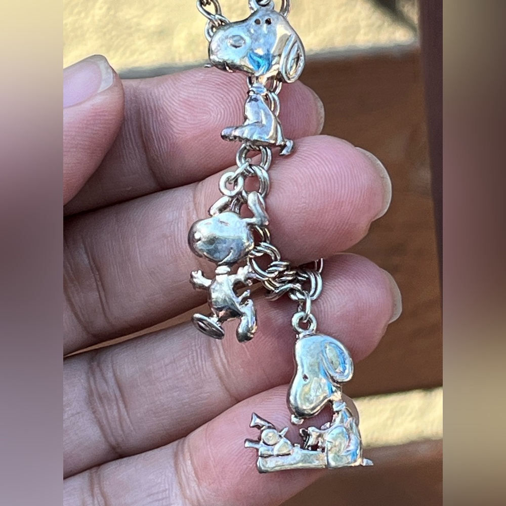Charming Silver Bracelet with Playful Charms - Picture 8 of 9